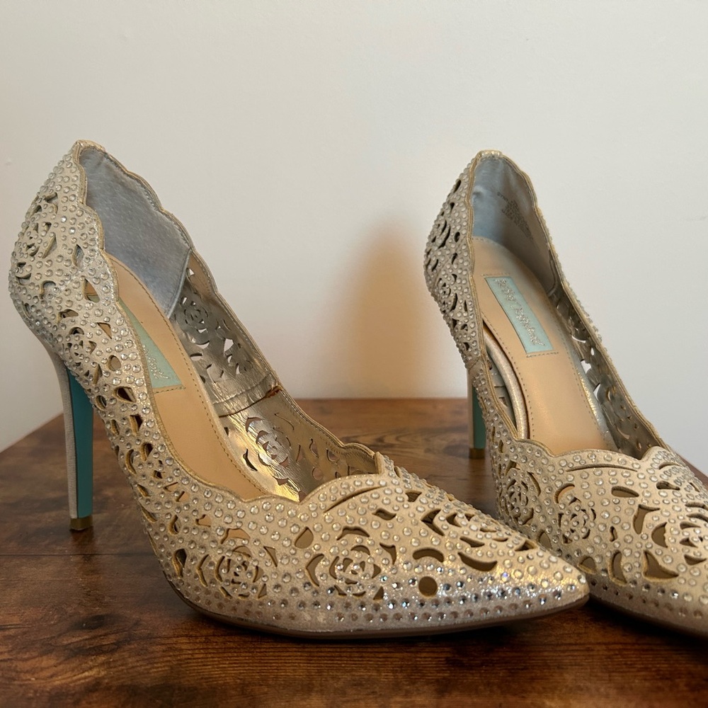 Cream Stiletto Heels with Intricate Cut-Out Design
